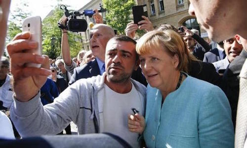 GermanyMerkelSelfieMigrant